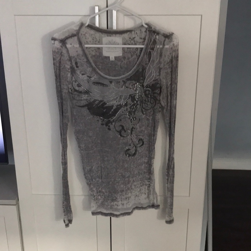 Maurice’s top with wing detail​